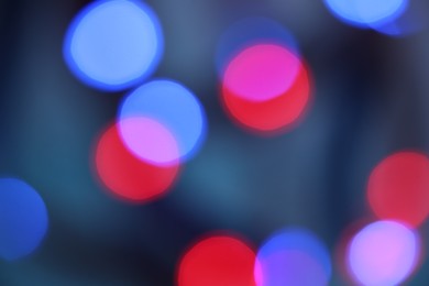 Blurred view of beautiful colorful lights. Bokeh effect