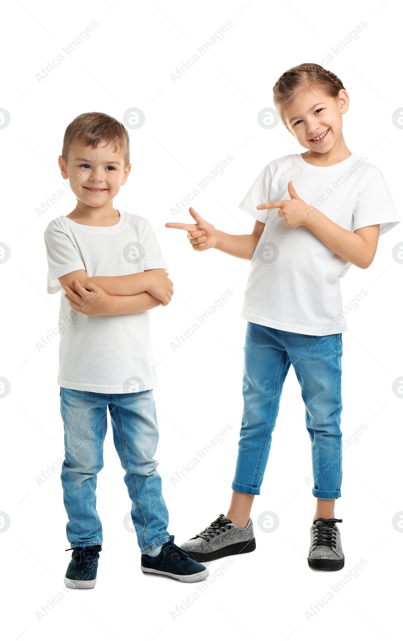 Photo of Little kids in t-shirts on white background. Mockup for design