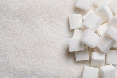 Refined and granulated white sugar as background, closeup