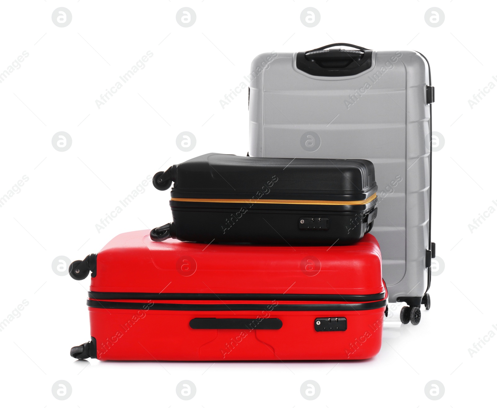 Photo of Modern suitcases for travelling on white background