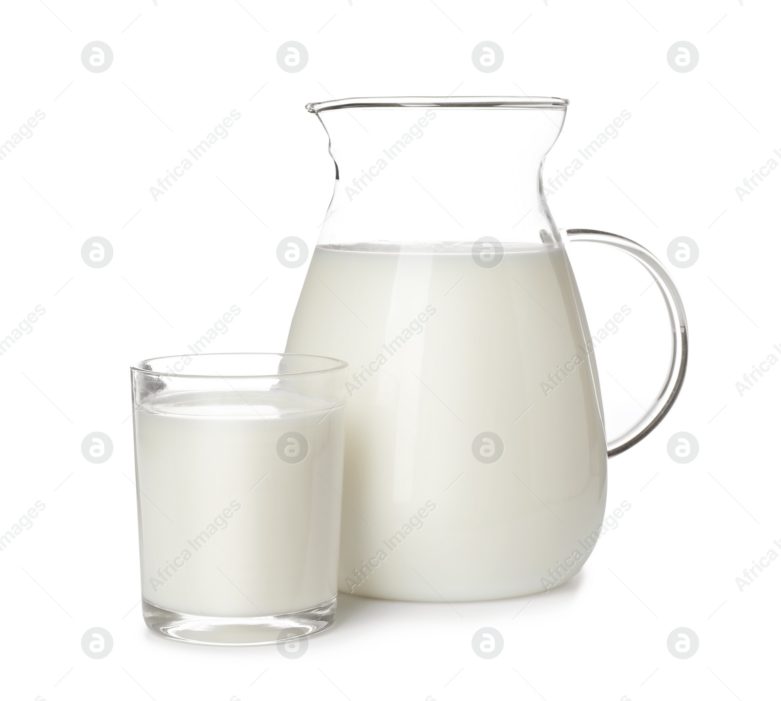 Photo of Glass and jug of fresh milk isolated on white
