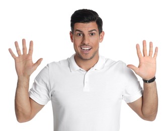 Man showing number ten with his hands on white background