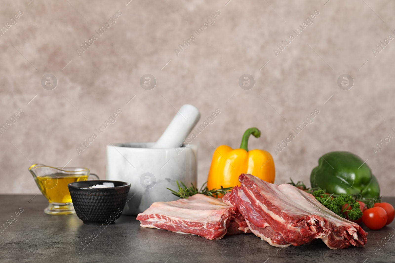 Photo of Composition with raw meat on table. Space for text