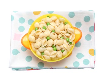Photo of Bowl with tasty pasta and peas on white background, top view