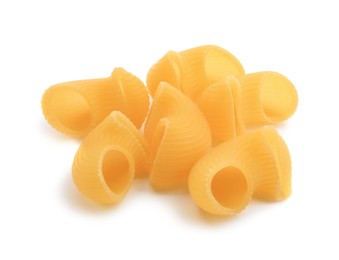 Photo of Raw horns pasta isolated on white. Italian cuisine