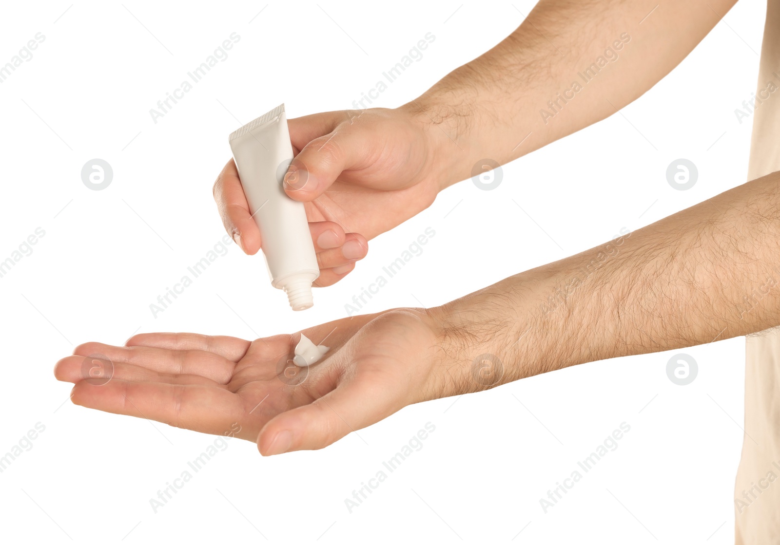 Photo of Man applying cream onto hand against white background, closeup