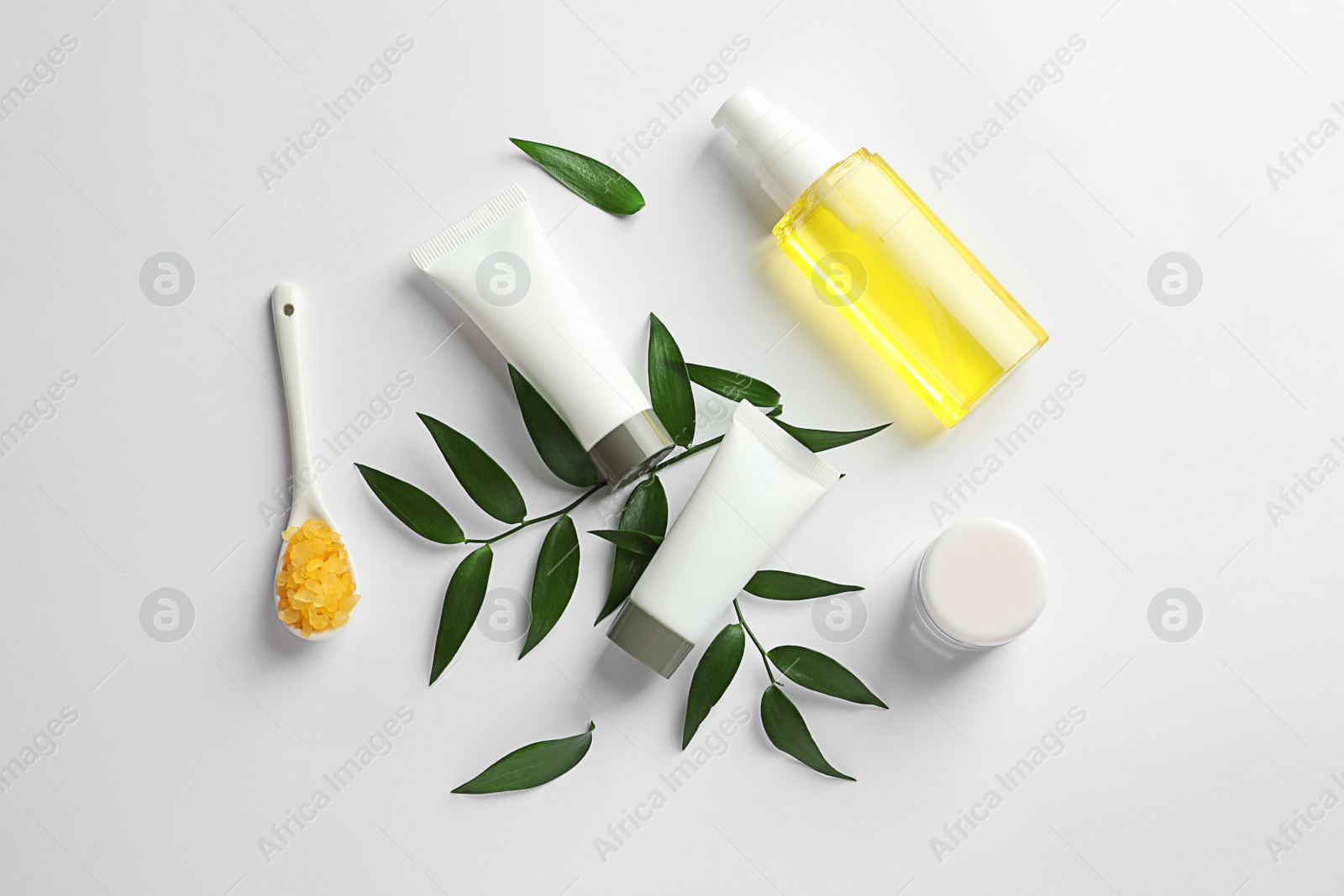 Photo of Flat lay composition with cosmetic products on white background