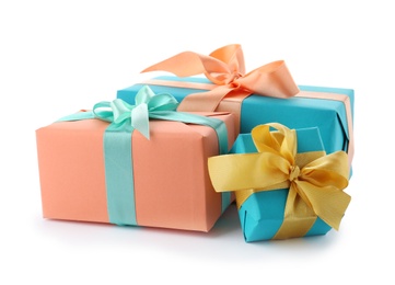 Beautiful gift boxes with ribbons on white background