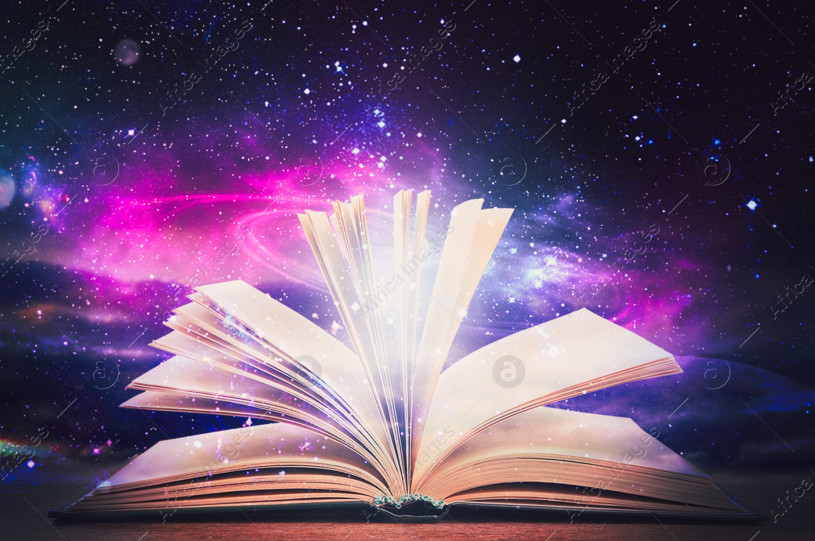 Image of Open book with glitter overlay and beautiful universe on background