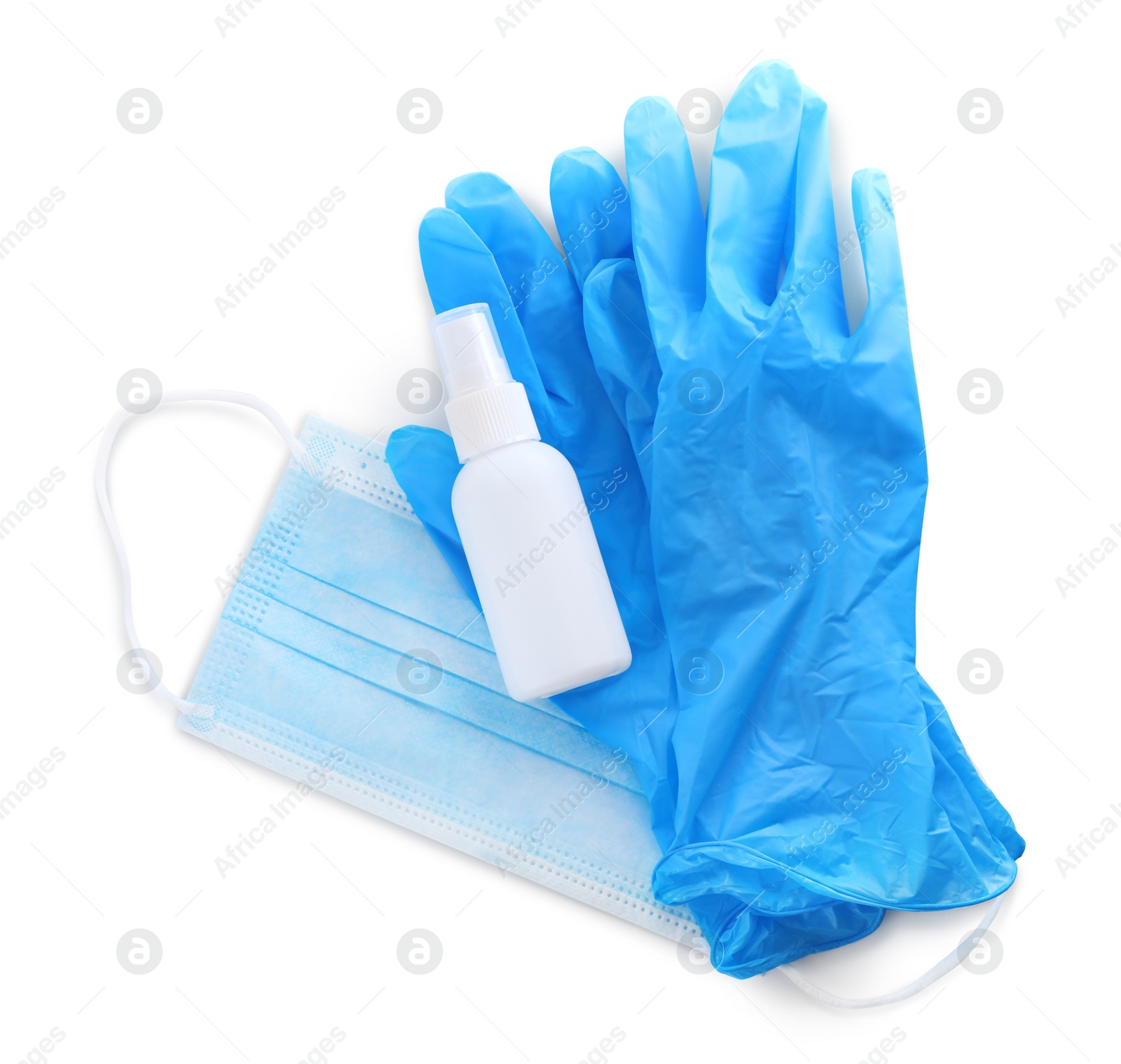 Photo of Protective mask, medical gloves and antiseptic on white background, top view