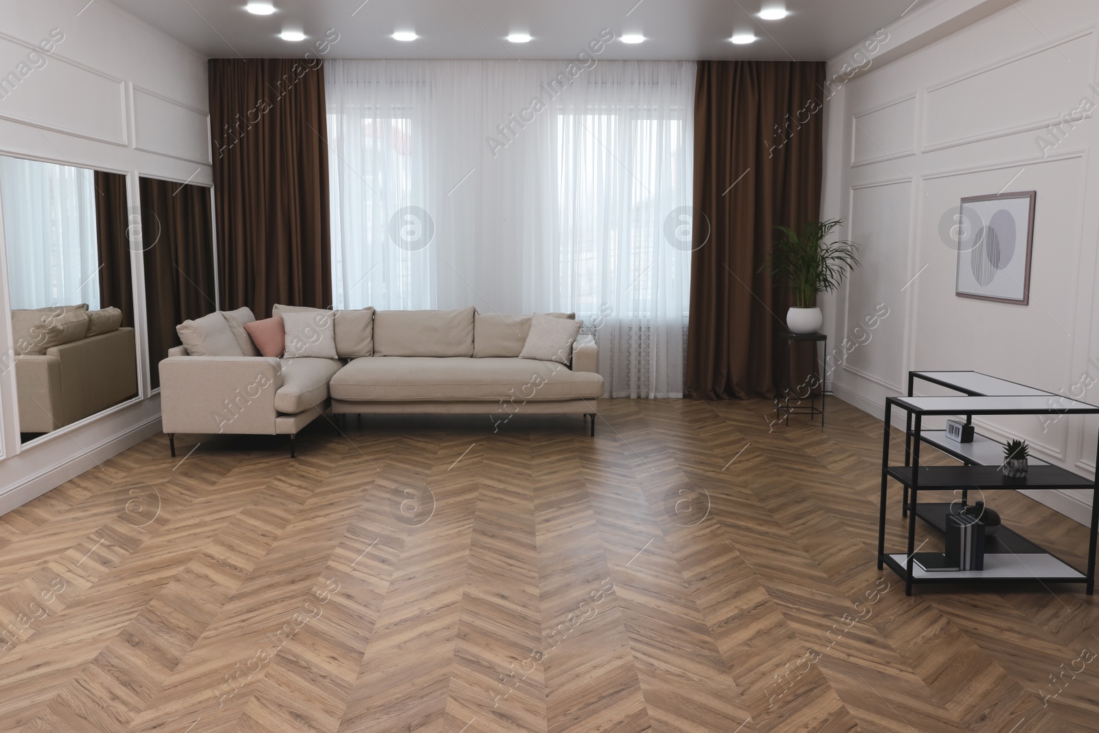 Photo of Modern living room with parquet flooring and stylish furniture