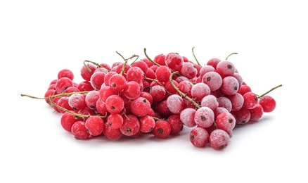 Heap of tasty frozen red currants on white background