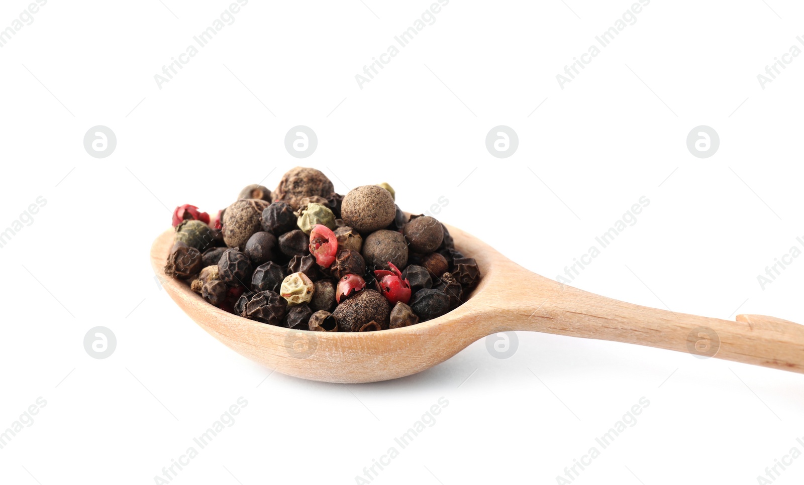 Photo of Pepper grains mix in wooden spoon isolated on white