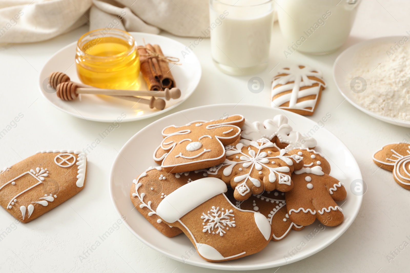 Photo of Delicious homemade Christmas cookies on white table