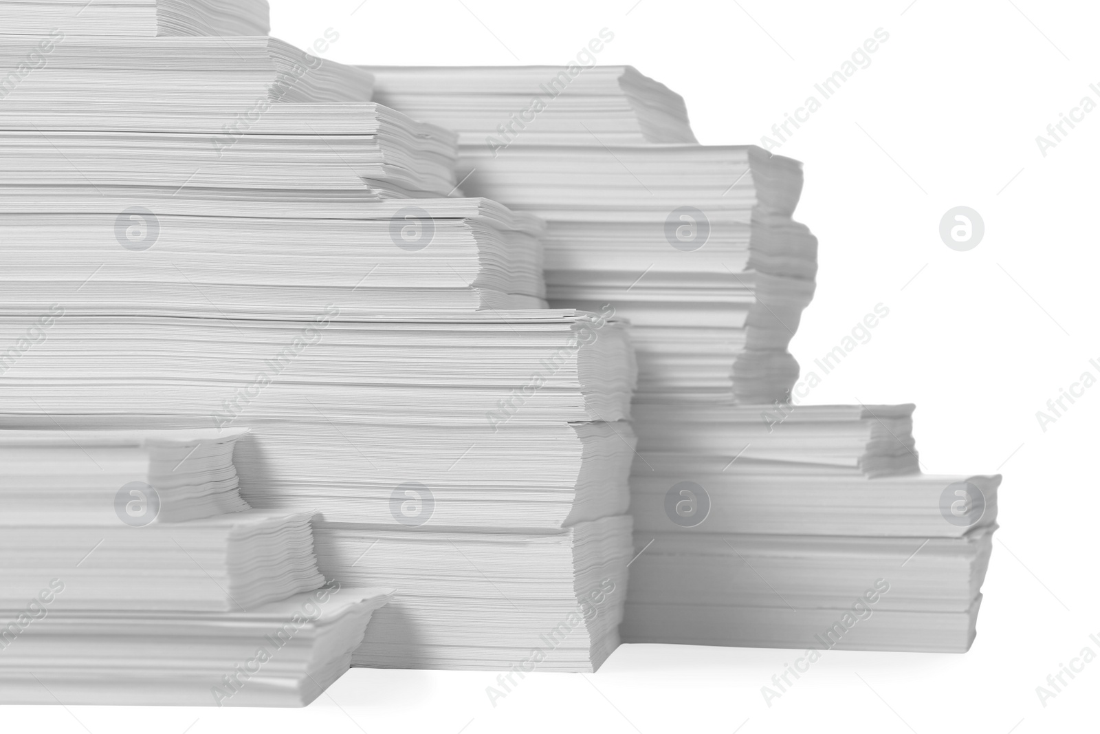 Photo of Stacks of paper sheets on white background