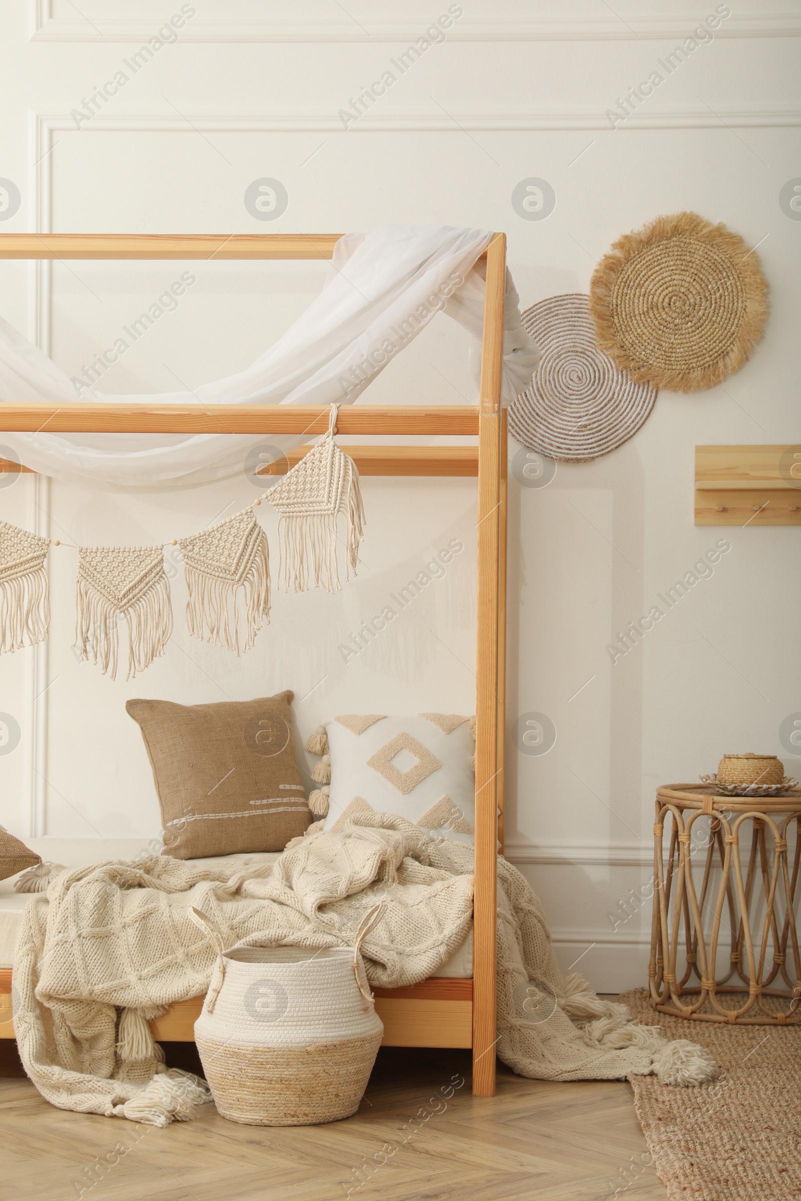 Photo of Stylish child room interior with house bed