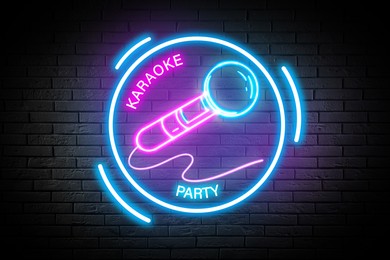 Glowing neon sign with microphone and words Karaoke Party on brick wall