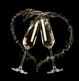 Glasses with sparkling wine and splashes on black background