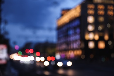 Blurred view of modern city at evening. Bokeh effect