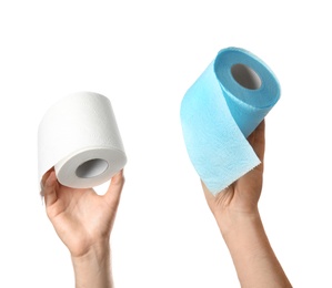 Woman holding rolls of toilet paper on white background