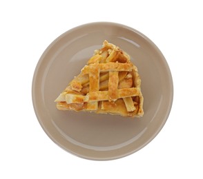 Photo of Plate with piece of tasty homemade quince pie isolated on white, top view