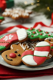 Tasty homemade Christmas cookies on white table