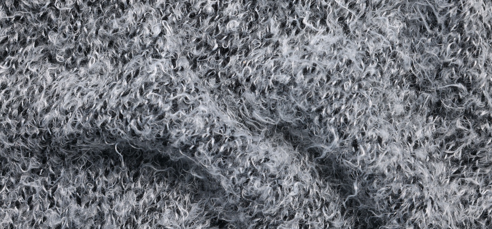 Photo of Texture of soft color crumpled fabric as background, top view