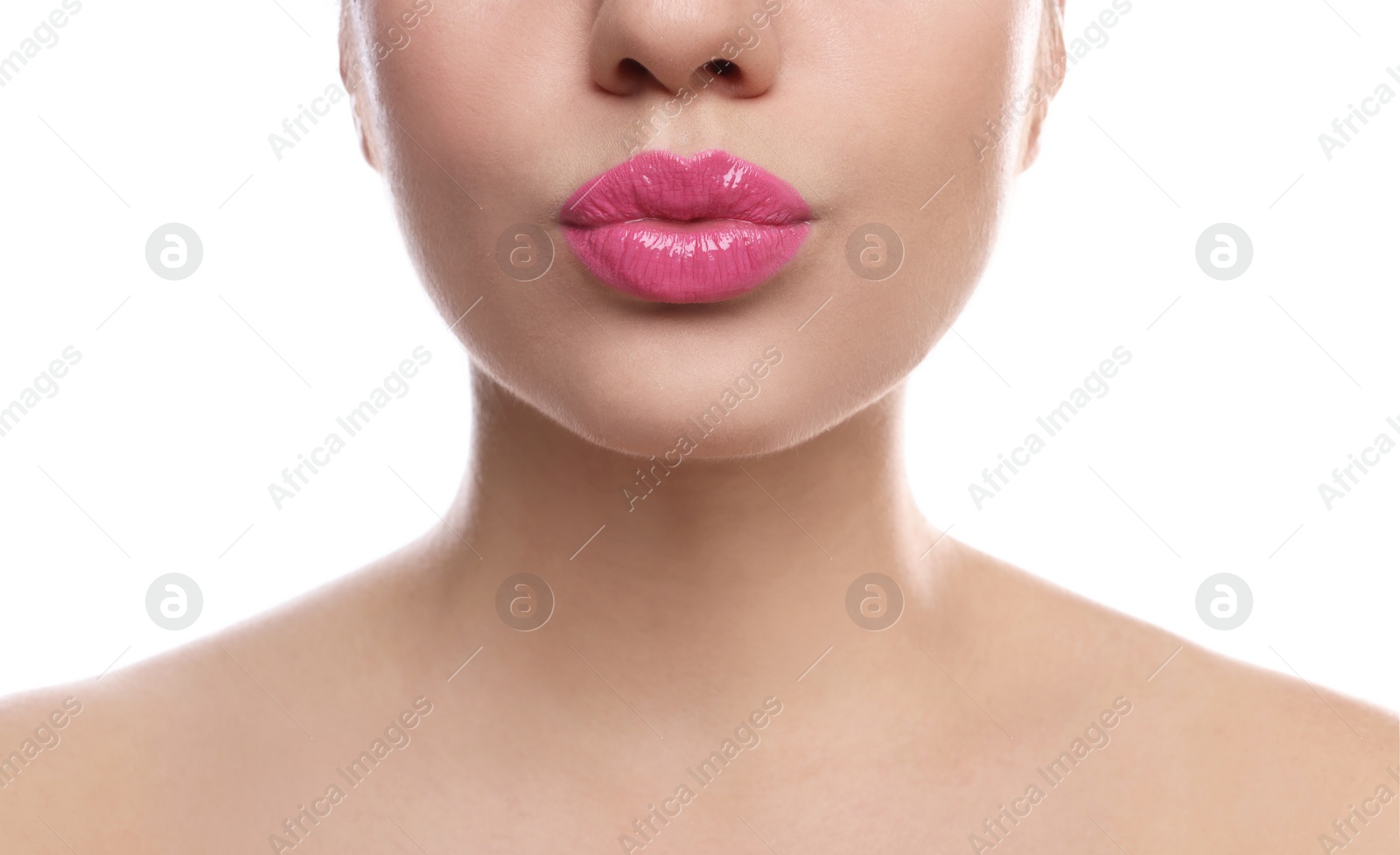 Photo of Closeup view of beautiful woman puckering lips for kiss on white background