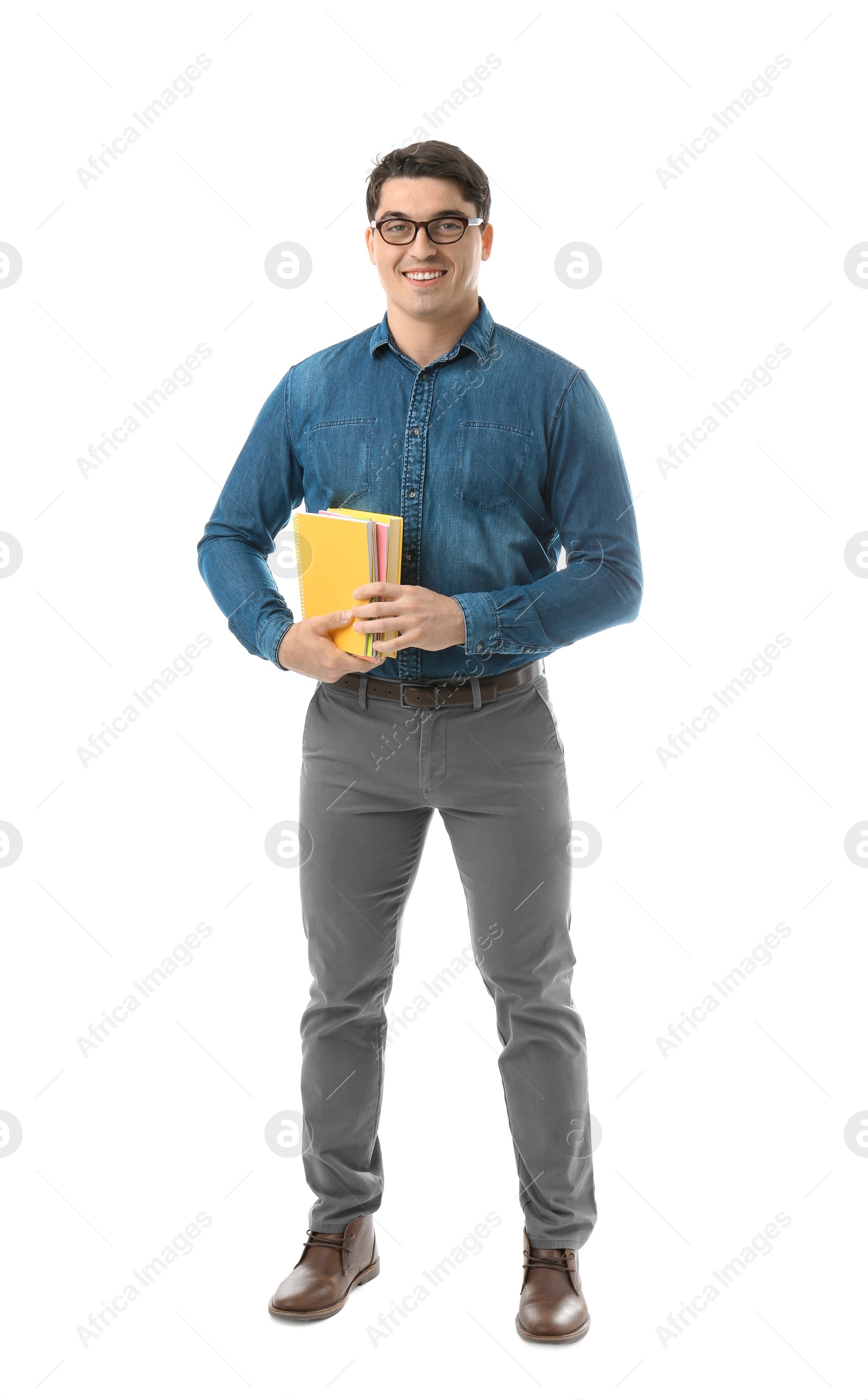 Photo of Male teacher with notebooks on white background