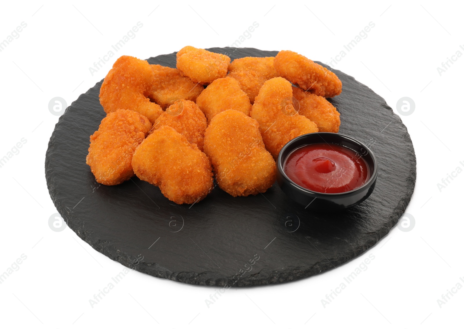 Photo of Tasty chicken nuggets with ketchup isolated on white