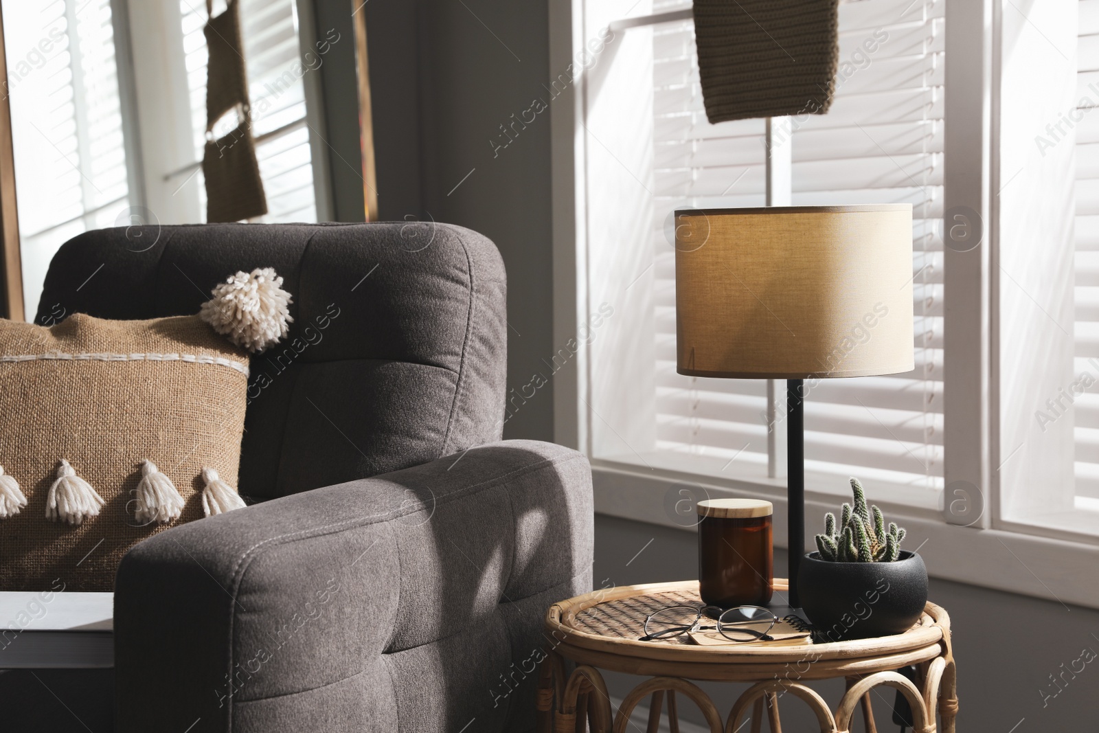 Photo of Room interior with stylish lamp and furniture