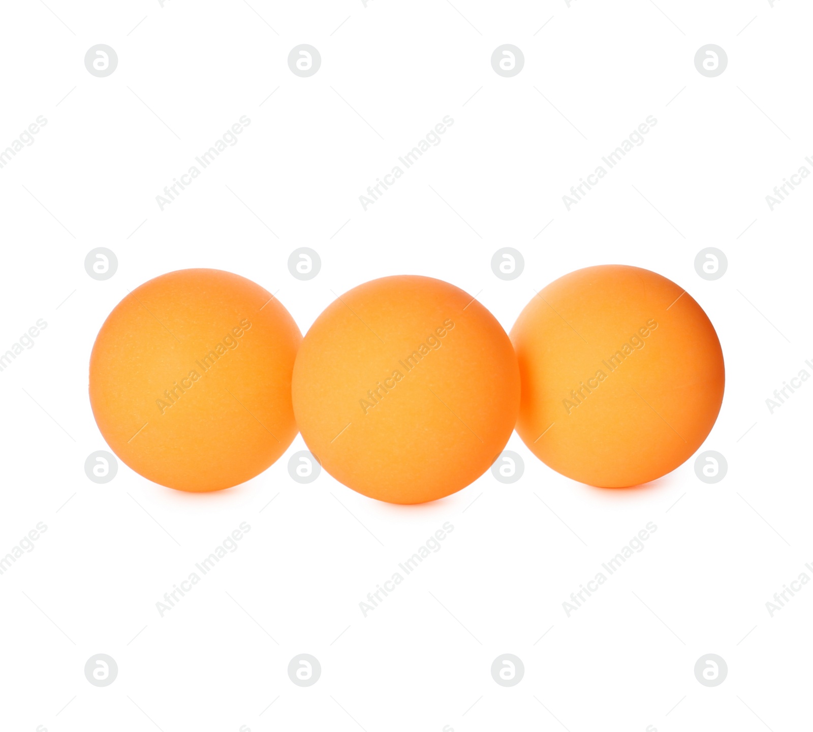 Photo of Orange plastic balls for table tennis on white background