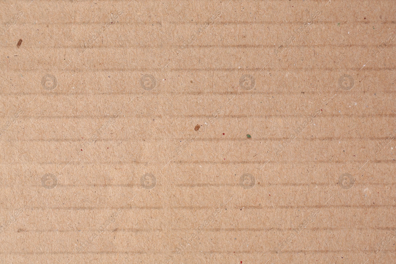 Photo of Texture of beige paper sheet as background, closeup