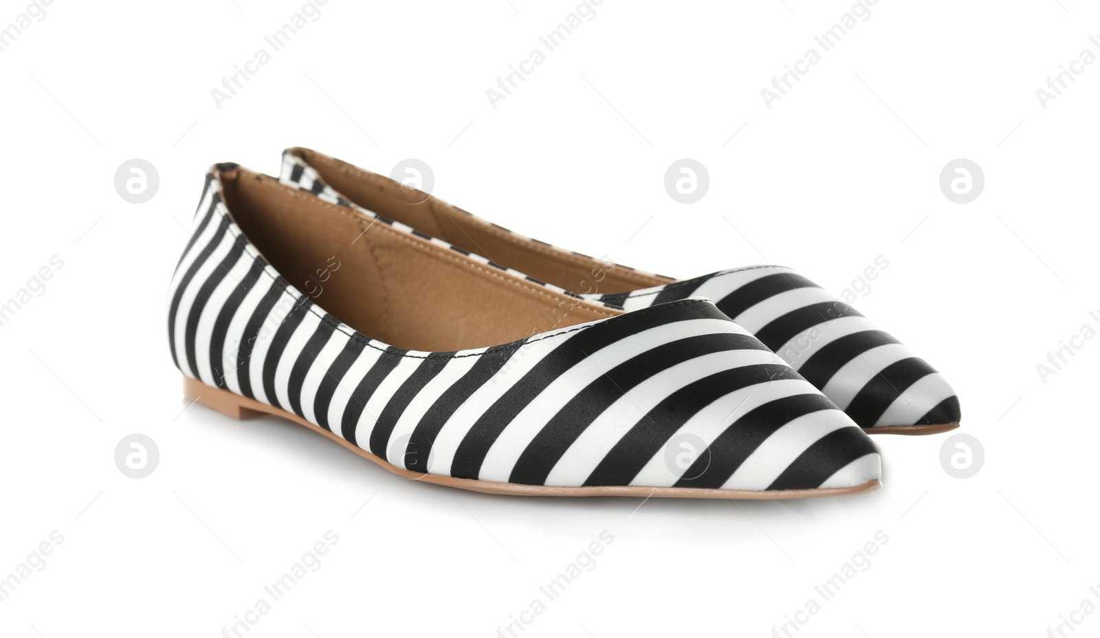 Photo of Pair of female shoes on white background