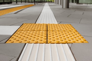 Photo of Tiles with tactile ground surface indicators, closeup view