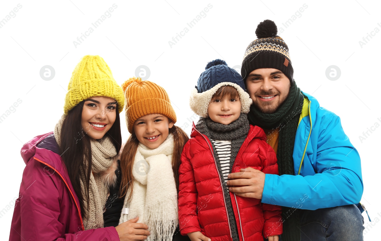 Photo of Happy family in warm clothes on white background. Winter vacation