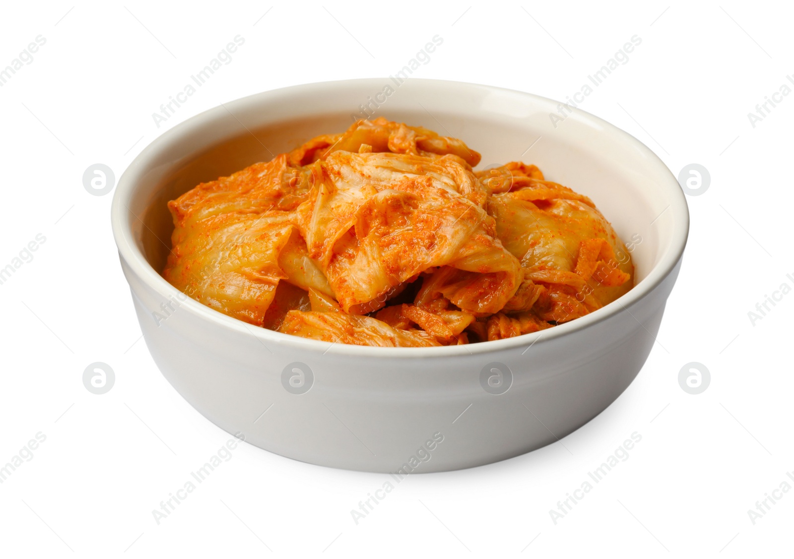 Photo of Bowl of spicy cabbage kimchi isolated on white