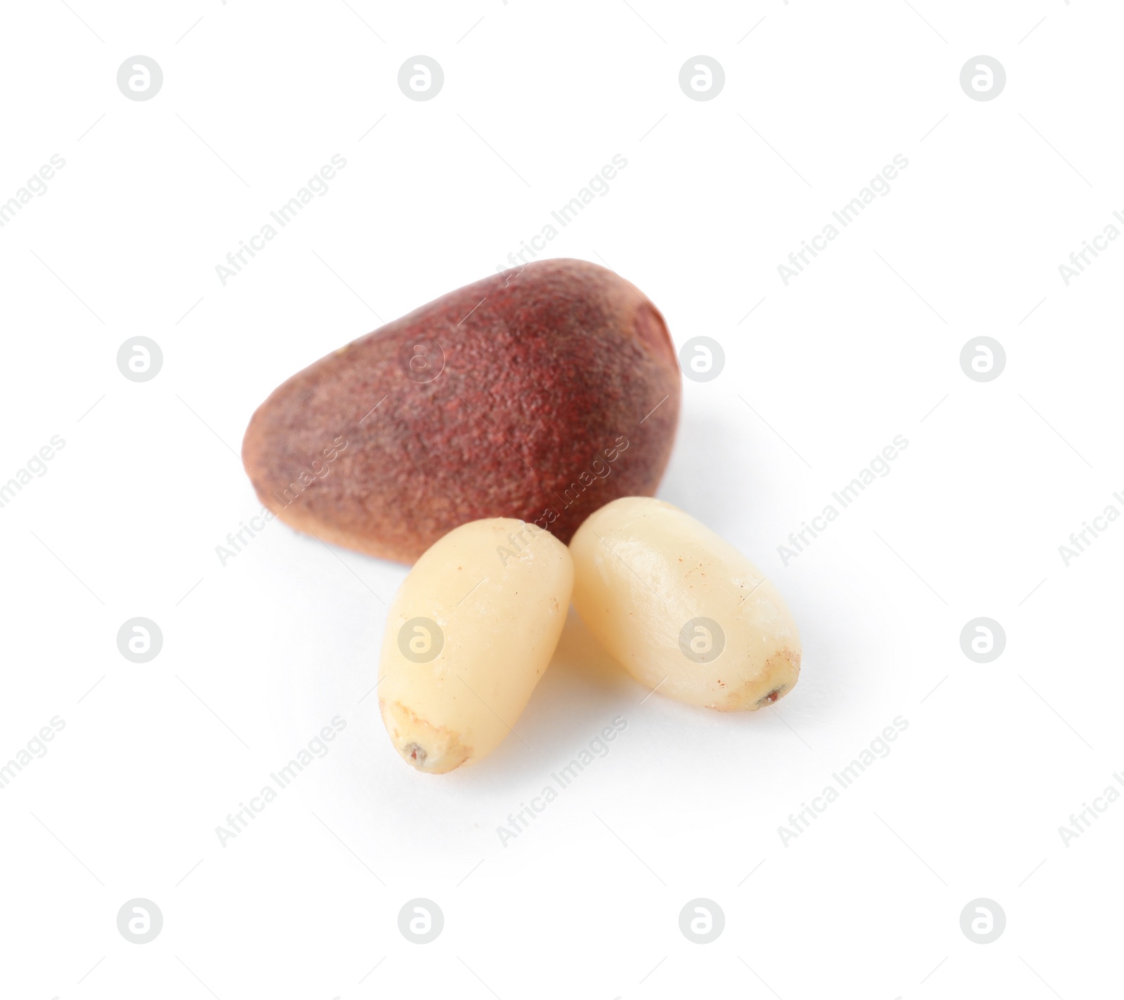 Photo of Pine nuts on white background. Healthy snack