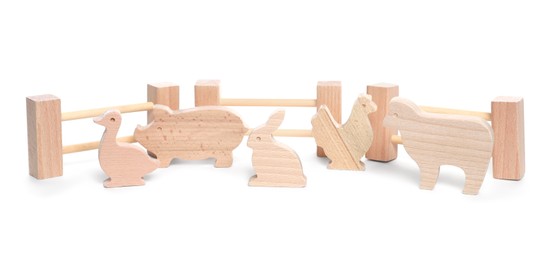 Kit with wooden farm animal figures isolated on white. Educational toy for motor skills development