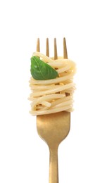 Fork with tasty pasta and basil isolated on white