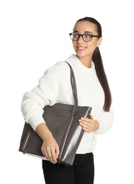 Woman with stylish shopper bag on white background