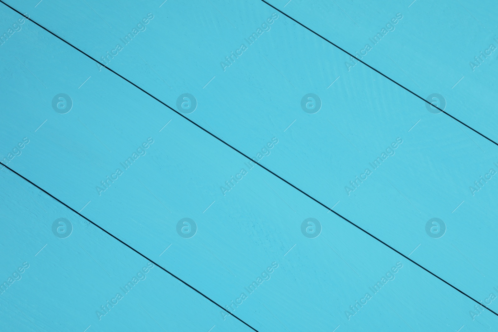 Photo of Texture of light blue wooden surface as background, closeup