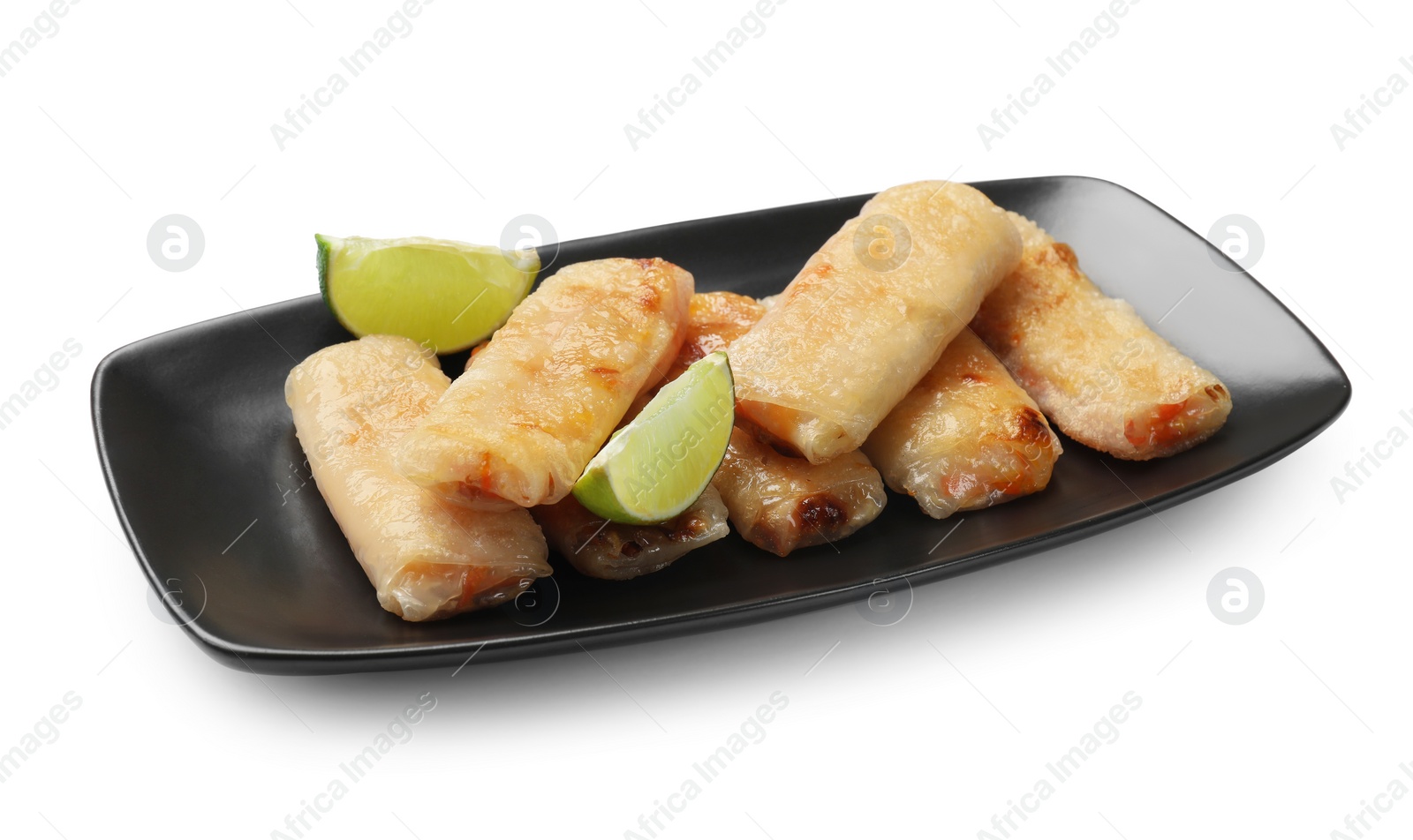 Photo of Tasty fried spring rolls and lime isolated on white