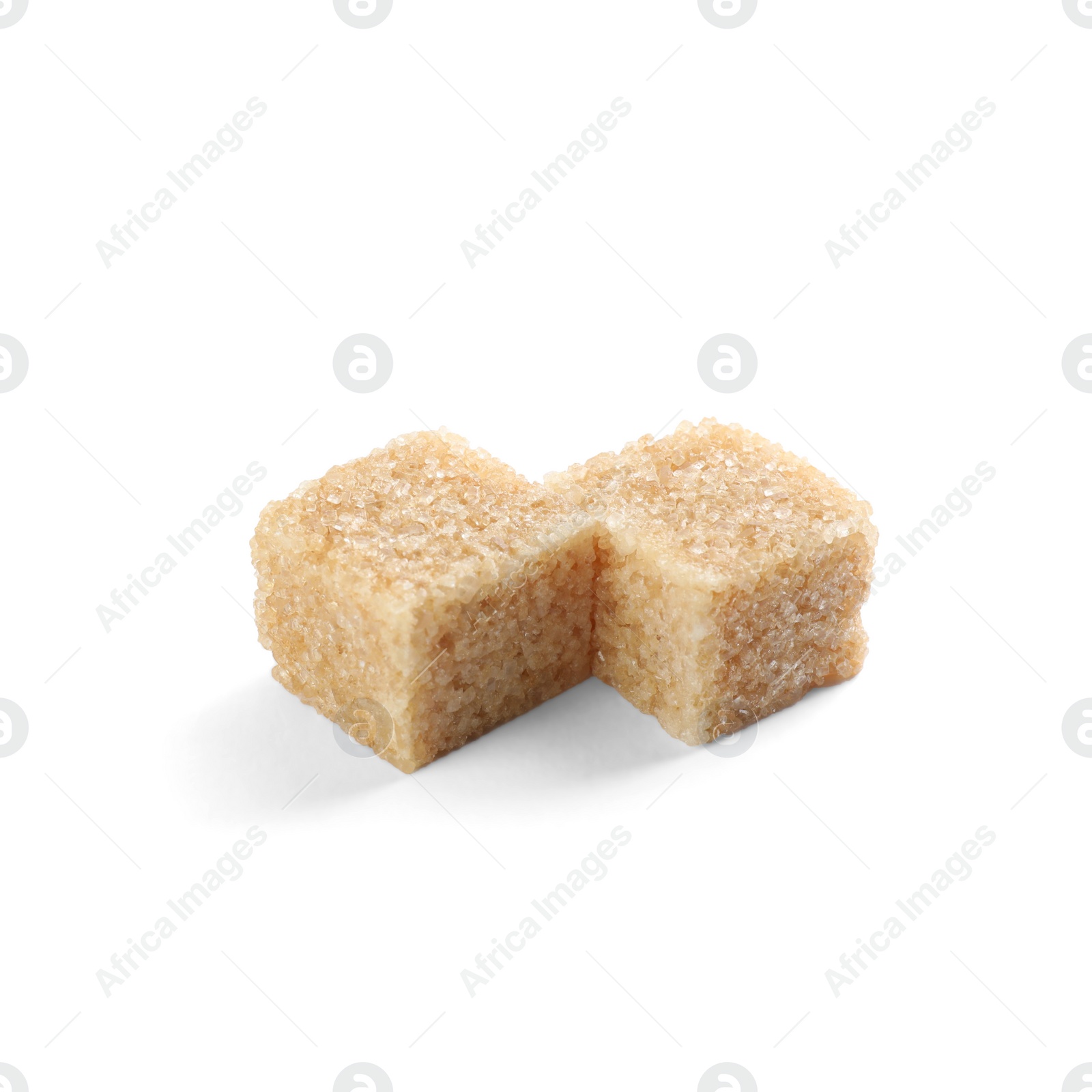 Photo of Two brown sugar cubes isolated on white