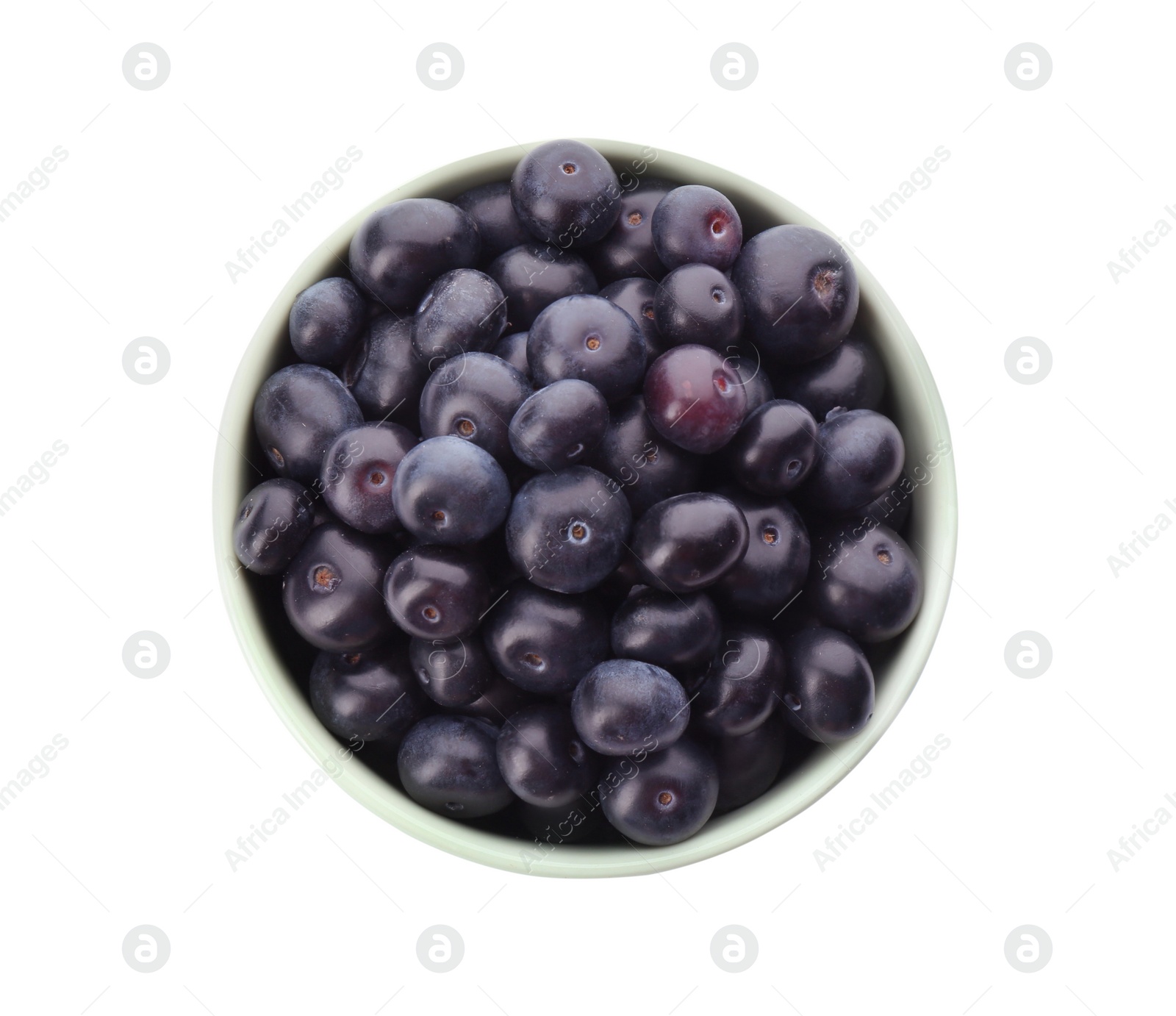 Photo of Fresh acai berries in bowl isolated on white, top view