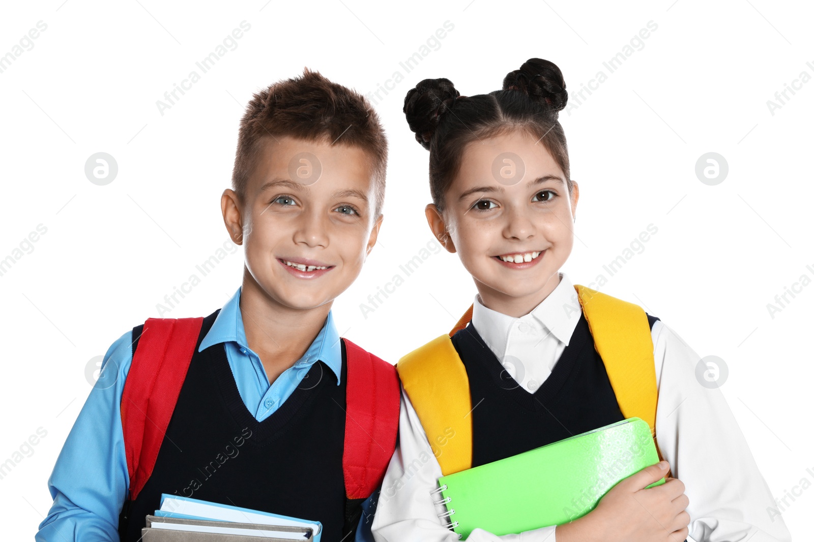 Photo of Happy children in school uniform on white background