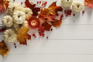 Photo of Flat lay composition with dry autumn leaves on white wooden table, space for text