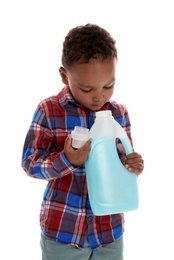 Photo of Little African-American boy playing with detergent on white background. Danger at home