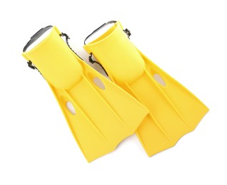 Pair of yellow flippers on white background, top view