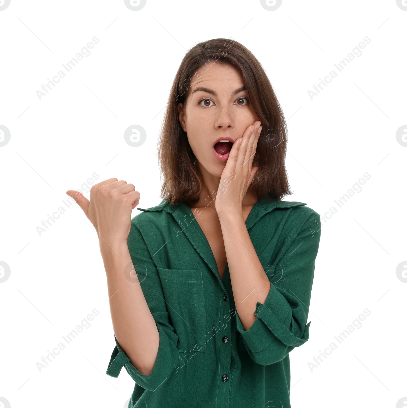 Photo of Special promotion. Emotional woman pointing at something on white background